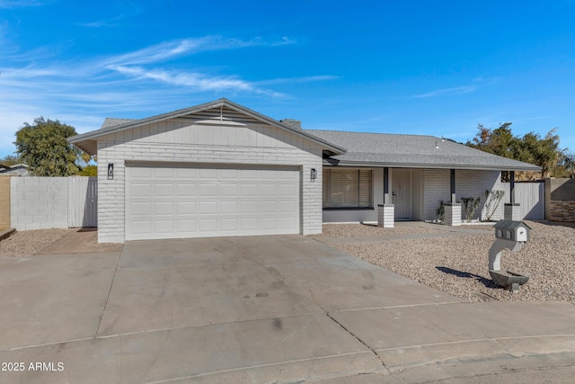 ranch-style home featuring a garage