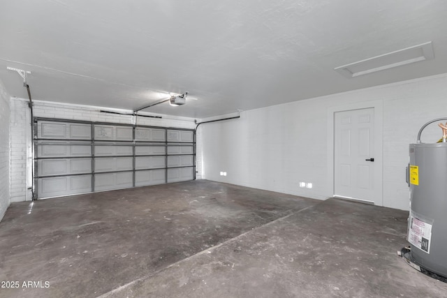 garage with water heater and a garage door opener