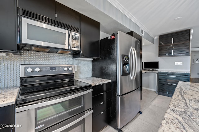 kitchen featuring ornamental molding, stainless steel appliances, light tile patterned floors, and tasteful backsplash