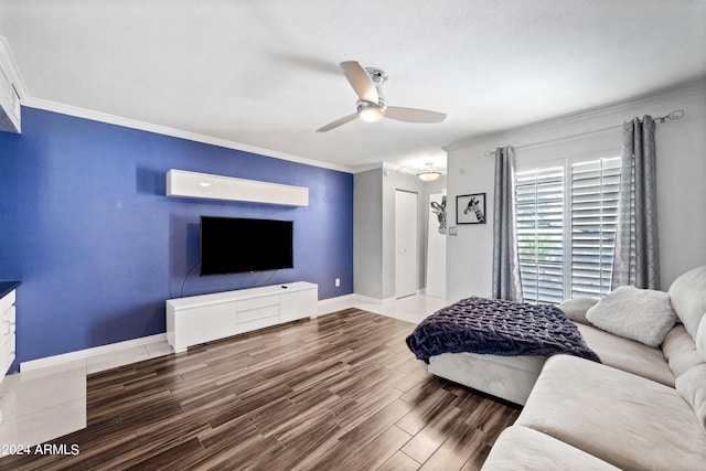 living room featuring crown molding, hardwood / wood-style floors, and ceiling fan