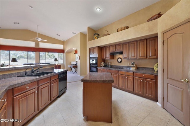 kitchen featuring a kitchen island, lofted ceiling, sink, ceiling fan, and black appliances