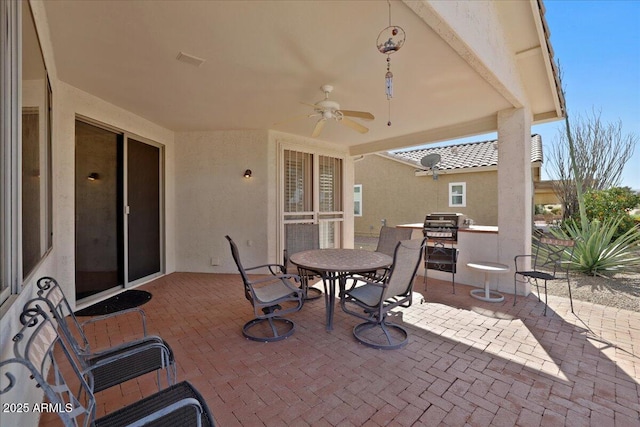 view of patio / terrace with ceiling fan