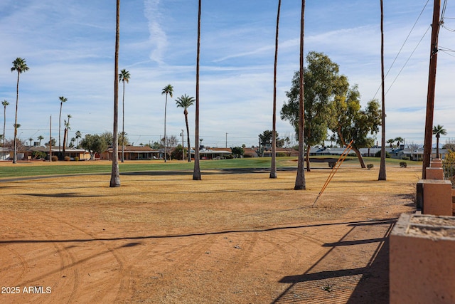 surrounding community featuring a lawn