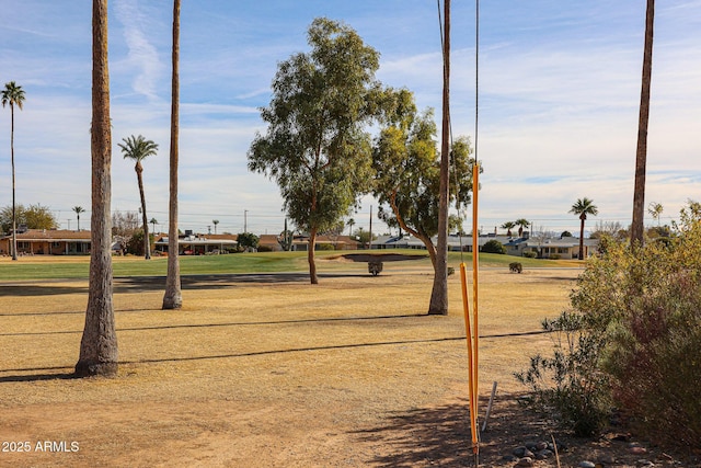 view of home's community featuring a yard