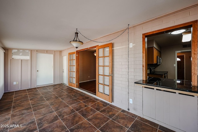 interior space with brick wall