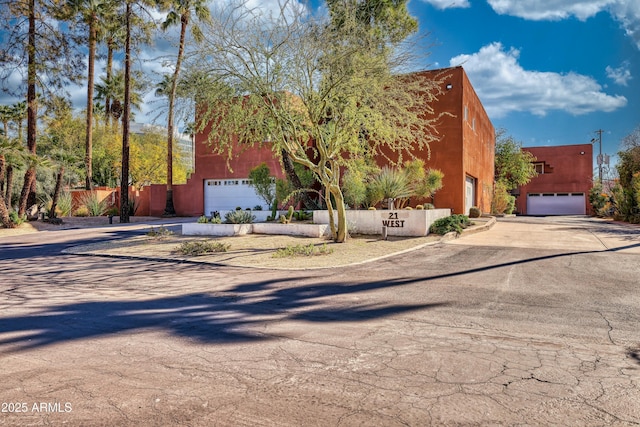 view of front of home featuring a garage