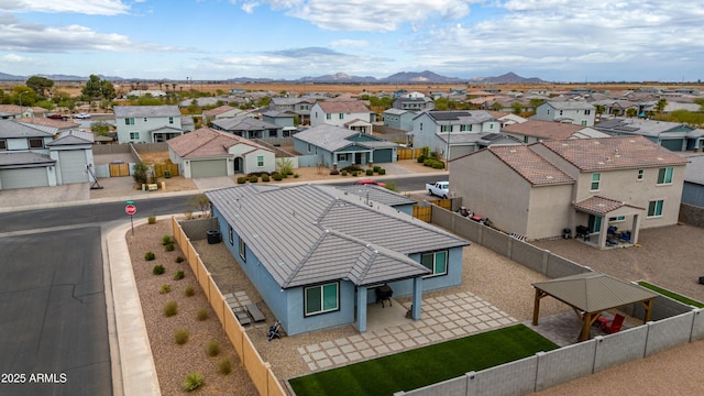 bird's eye view featuring a mountain view and a residential view