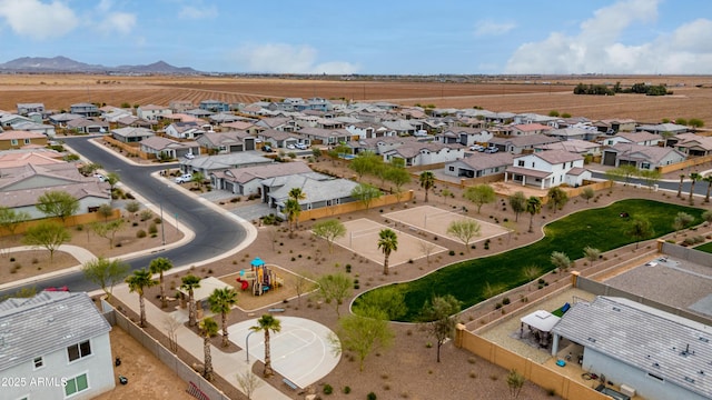 bird's eye view with a residential view and a mountain view