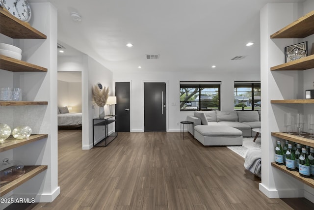 living room featuring dark hardwood / wood-style flooring