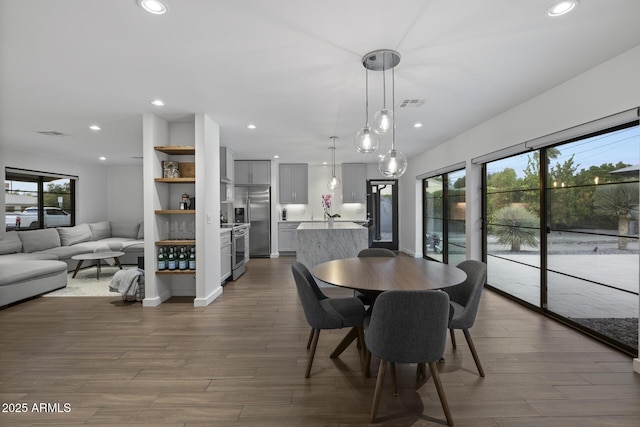 dining room featuring dark hardwood / wood-style flooring