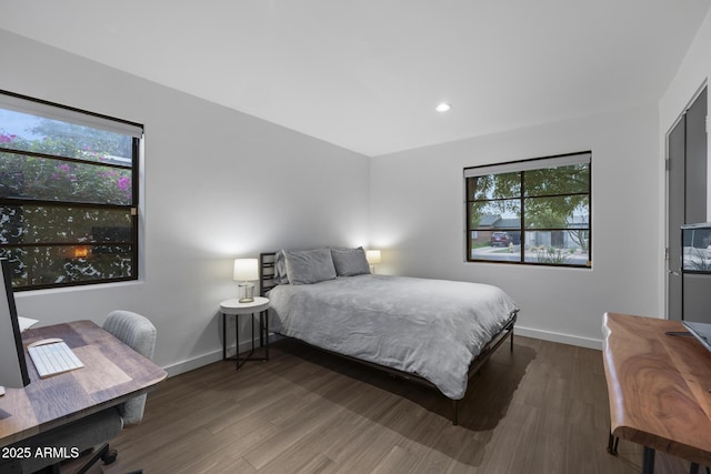 bedroom featuring dark wood-type flooring