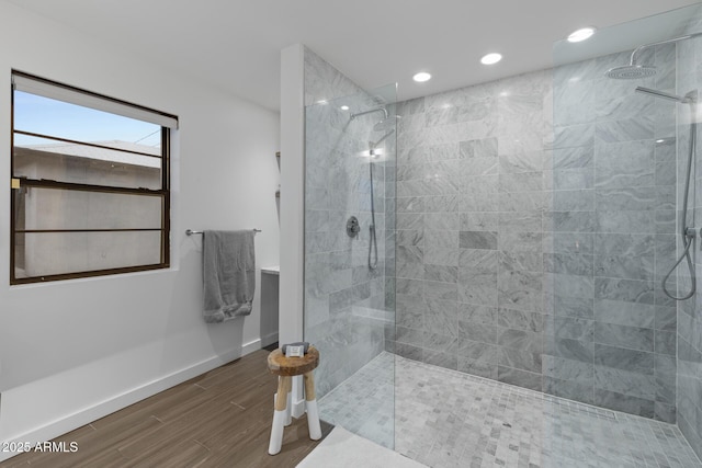 bathroom featuring a tile shower