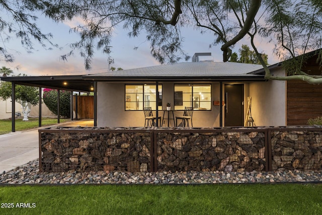 view of front of house featuring a carport