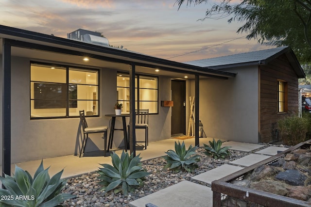 exterior space with a patio area