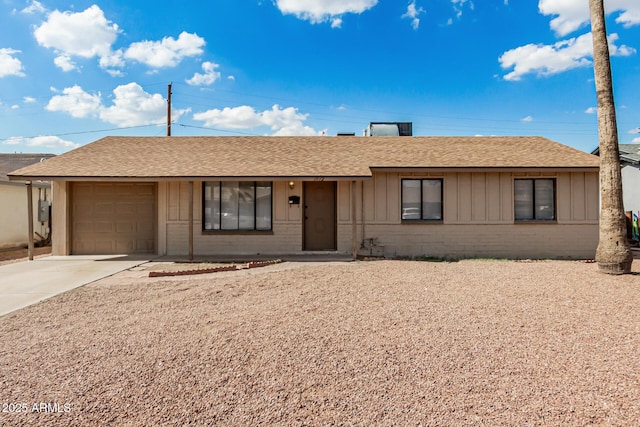 1512 W Crescent Ave, Mesa, AZ 85202 - ranch-style house featuring a garage, a shingled roof, brick siding, concrete driveway, and board and batten siding