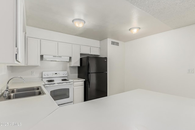 1512 W Crescent Ave, Mesa, AZ 85202 - kitchen with electric range, freestanding refrigerator, a sink, under cabinet range hood, and light countertops