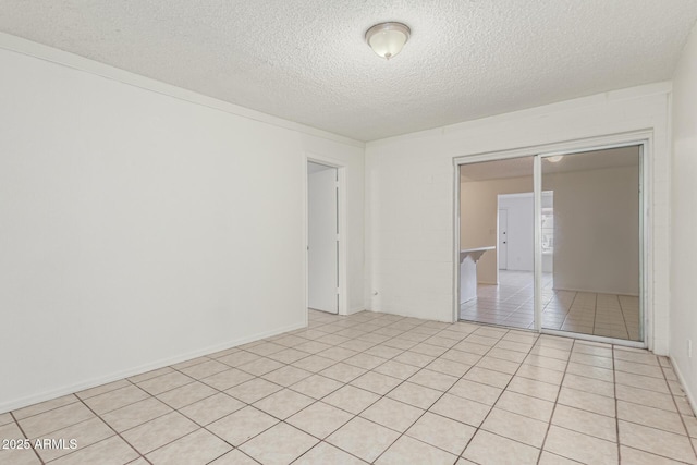 1512 W Crescent Ave, Mesa, AZ 85202 - empty room with a textured ceiling and light tile patterned flooring