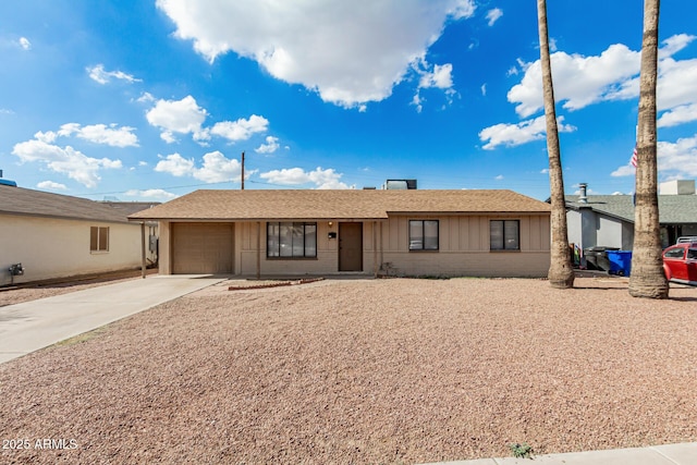 1512 W Crescent Ave, Mesa, AZ 85202 - ranch-style home with a garage, concrete driveway, brick siding, roof with shingles, and board and batten siding