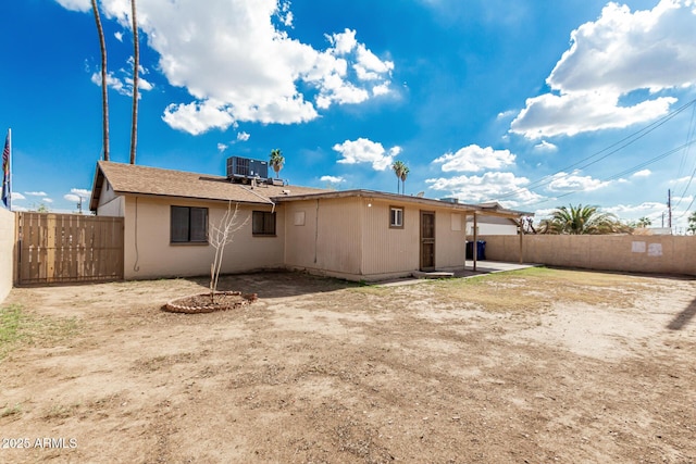 1512 W Crescent Ave, Mesa, AZ 85202 - back of house featuring a fenced backyard and central AC unit