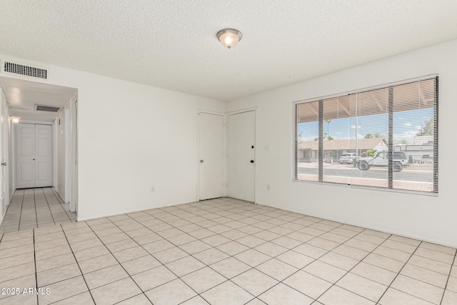 1512 W Crescent Ave, Mesa, AZ 85202 - spare room with a textured ceiling