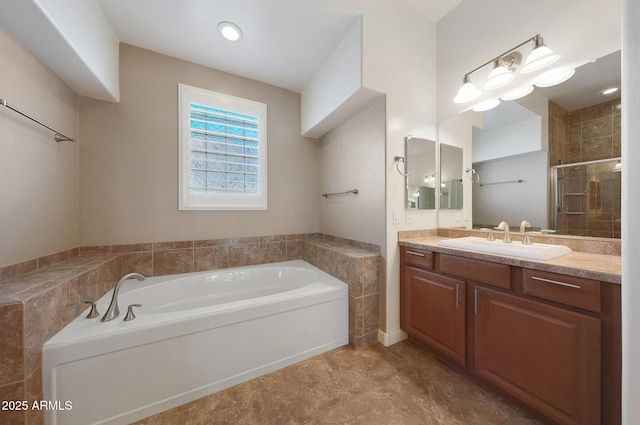 bathroom featuring vanity and a bathtub