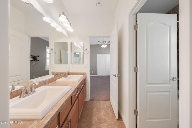 bathroom featuring vanity and ceiling fan