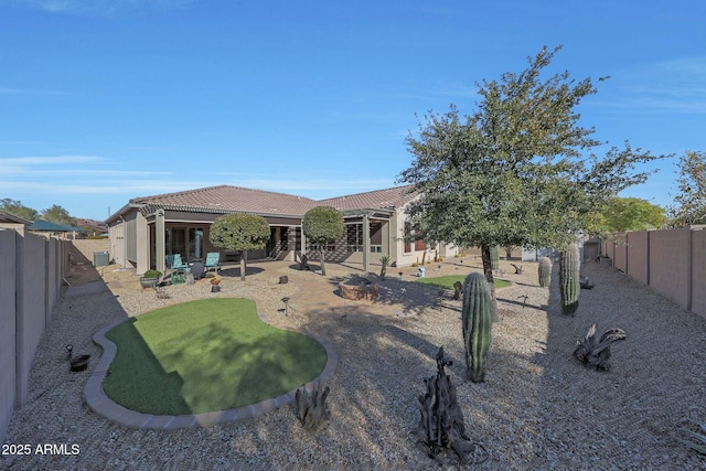 rear view of property with a patio area