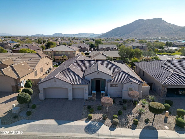 bird's eye view with a mountain view