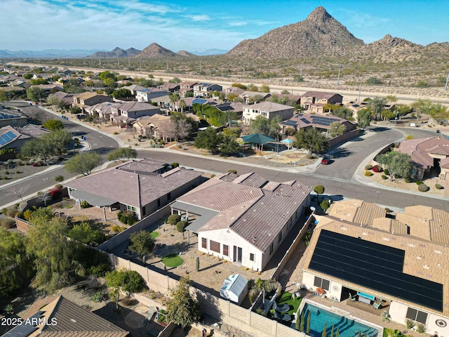 birds eye view of property featuring a mountain view