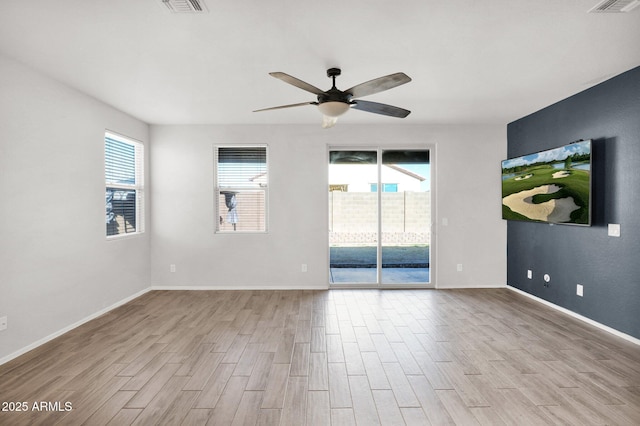 spare room with ceiling fan