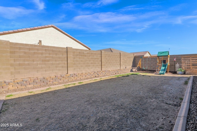 view of yard with a playground