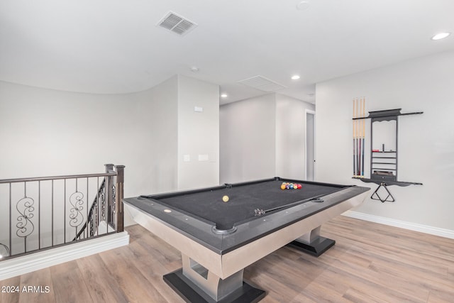 game room with light hardwood / wood-style flooring and pool table