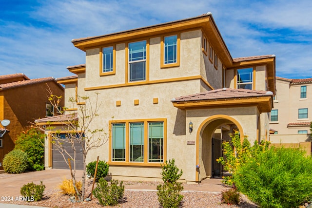 view of front of property featuring a garage