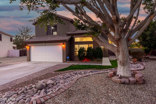 view of front of property featuring a garage