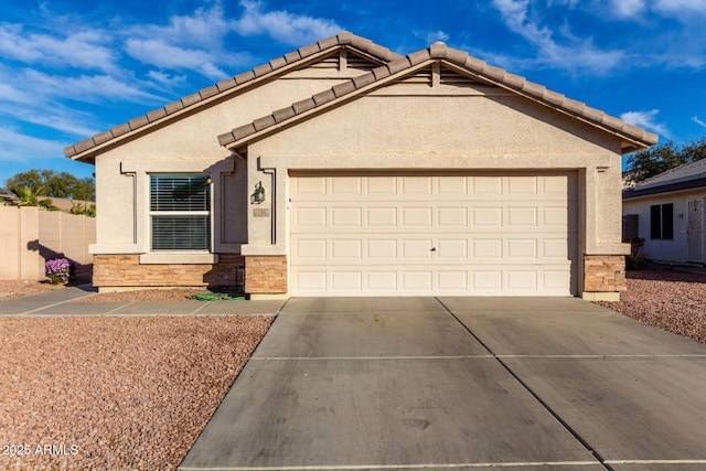 view of front of home with a garage