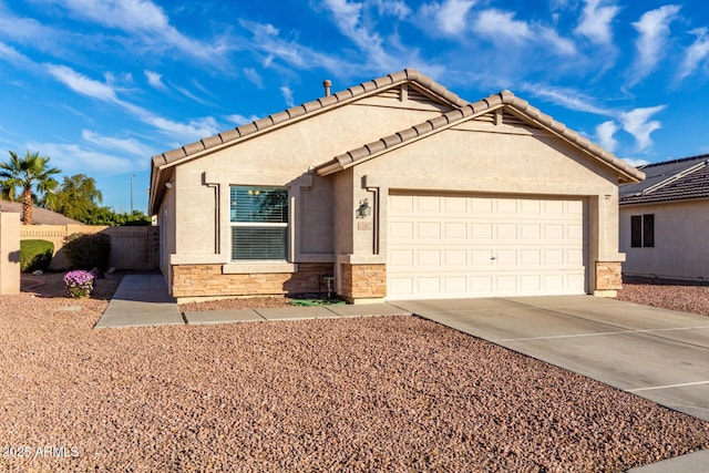 view of front of home with a garage