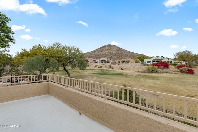 balcony featuring a mountain view