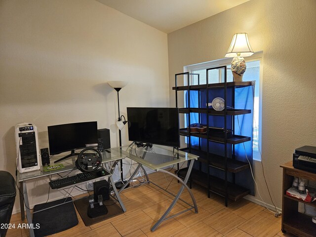 office space with light wood-type flooring