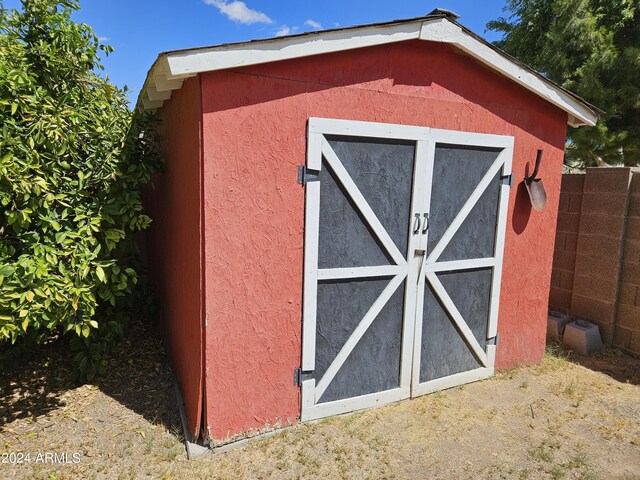 rear view of property featuring a patio