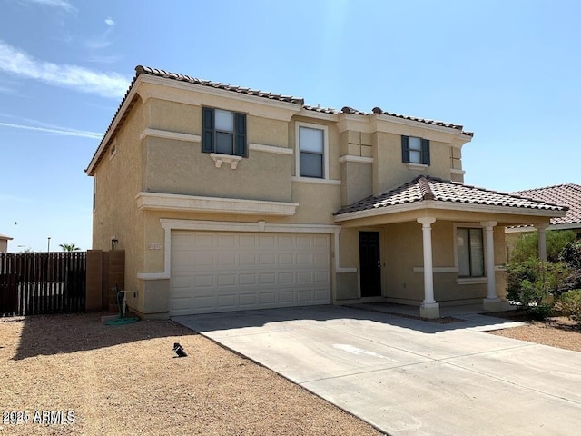 view of front of property with a garage