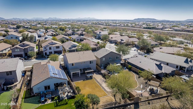 drone / aerial view featuring a mountain view