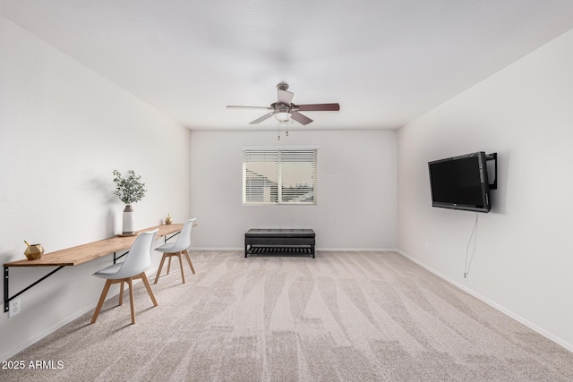 unfurnished office with light carpet and ceiling fan