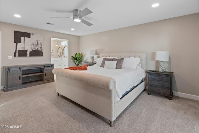 6220 E Paradise Ln, Scottsdale, AZ 85254 - bedroom with light carpet, recessed lighting, baseboards, connected bathroom, and ceiling fan
