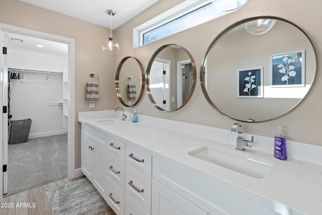 6220 E Paradise Ln, Scottsdale, AZ 85254 - full bathroom with double vanity and a spacious closet