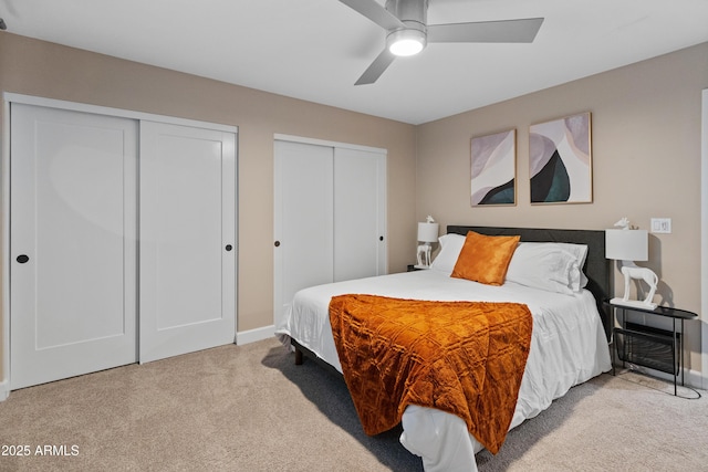 6220 E Paradise Ln, Scottsdale, AZ 85254 - bedroom with carpet flooring, multiple closets, baseboards, and ceiling fan