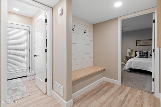 6220 E Paradise Ln, Scottsdale, AZ 85254 - mudroom with light wood-type flooring, recessed lighting, and baseboards