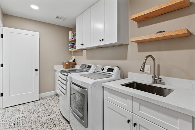 6220 E Paradise Ln, Scottsdale, AZ 85254 - clothes washing area featuring independent washer and dryer, cabinet space, baseboards, and recessed lighting
