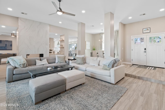 6220 E Paradise Ln, Scottsdale, AZ 85254 - living room featuring wood finished floors, recessed lighting, and a ceiling fan