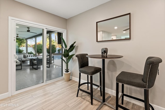 6220 E Paradise Ln, Scottsdale, AZ 85254 - dining space featuring baseboards, wood finished floors, and a ceiling fan