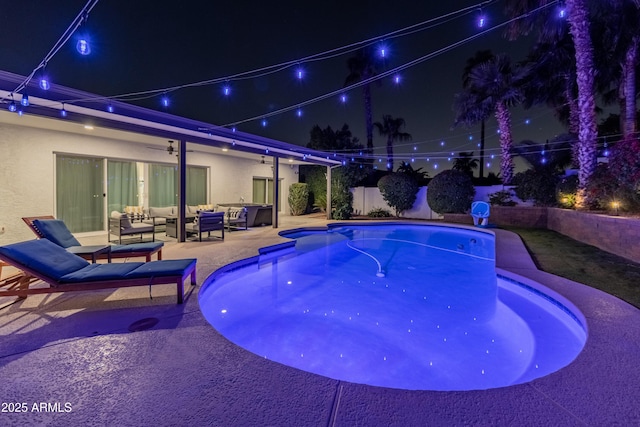 6220 E Paradise Ln, Scottsdale, AZ 85254 - pool at twilight featuring an outdoor hangout area, a patio, a fenced backyard, and ceiling fan